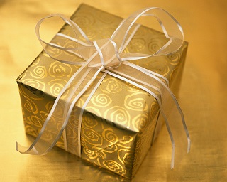 Christmas Present Wrapped in Gold and Silver